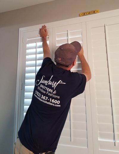 Shutter installation in Jacksonville bedroom.