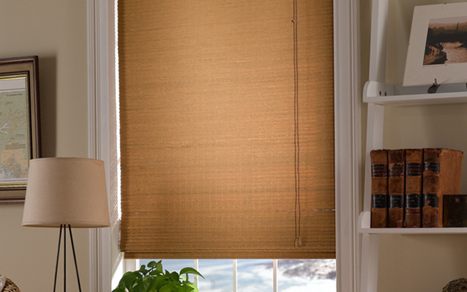 Add a touch of nature to your decor with woven fiber shades in Jacksonville. Tan woven fiber shades in a living room