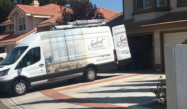 During an in-home consultation, we take the showroom to your house. Alt text: Sunburst Shutters van at customer's home.
