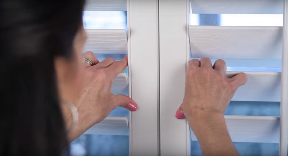 Closing The Panels Of Your Energy Efficient Shutters In Jacksonville, FL Shutting plantation shutters